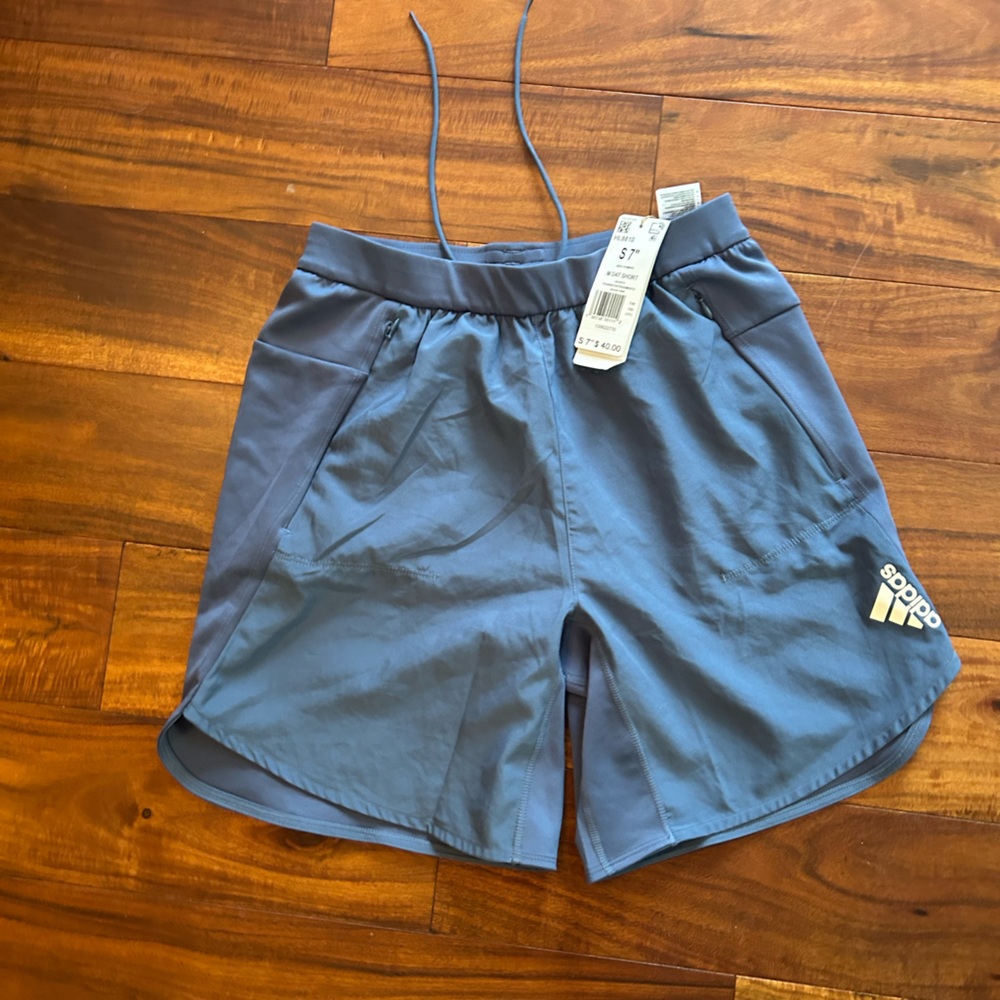 NWT ($30). Men’s Adidas training short  7 inches size medium